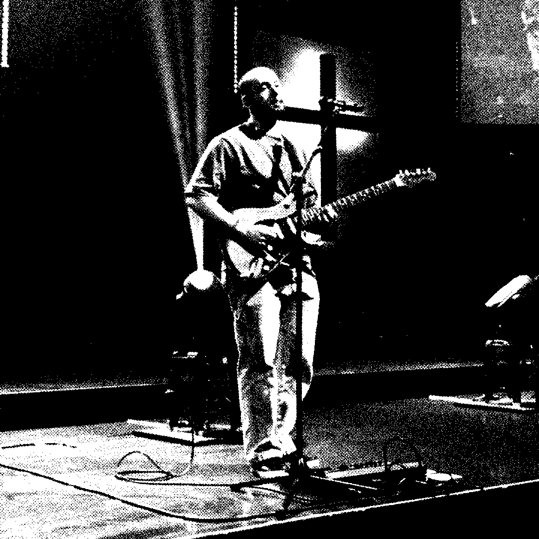 Gabriel playing electric guitar at church