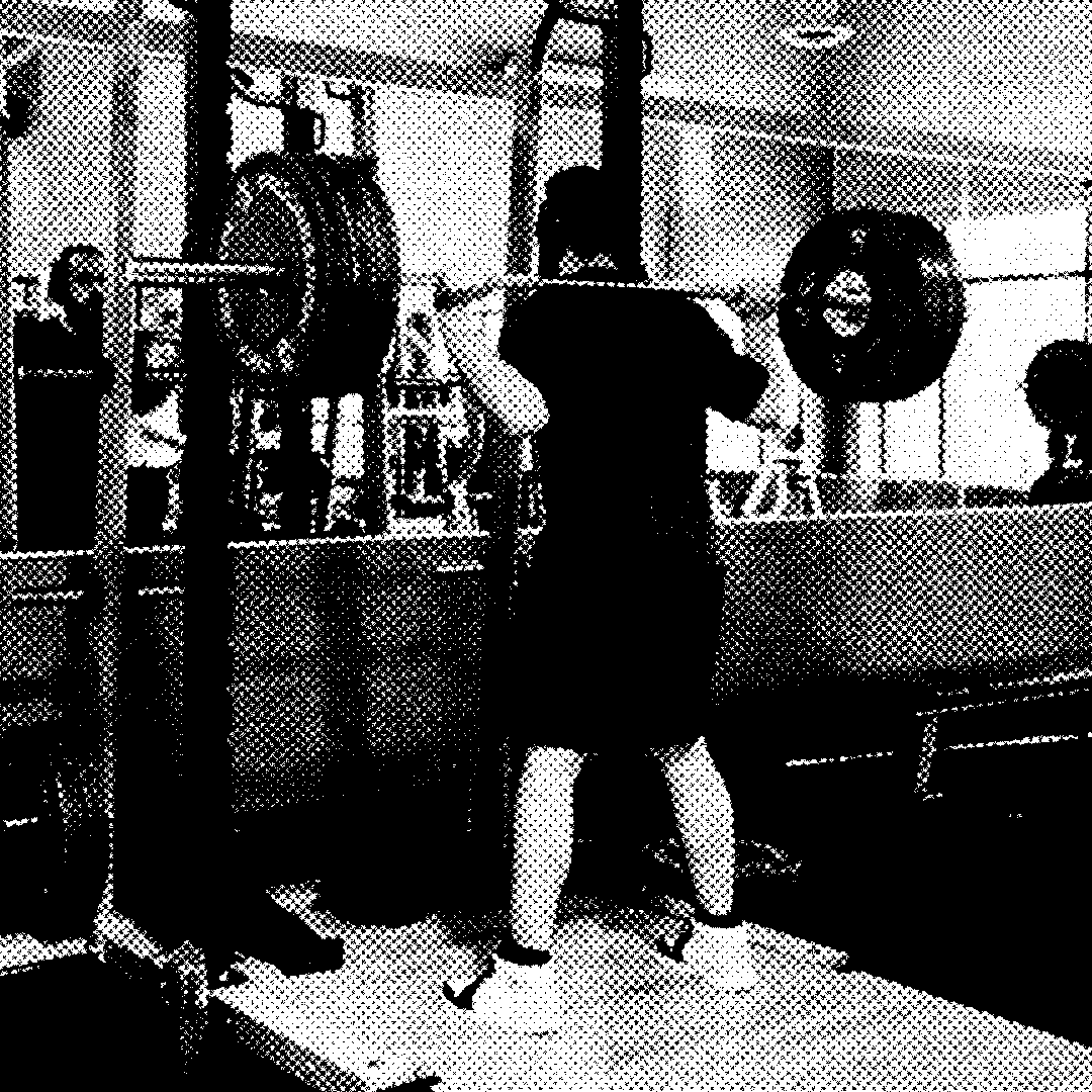 Gabriel doing 275lbs squats at the gym